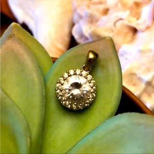 Gold tone clear stone halo pendent necklace